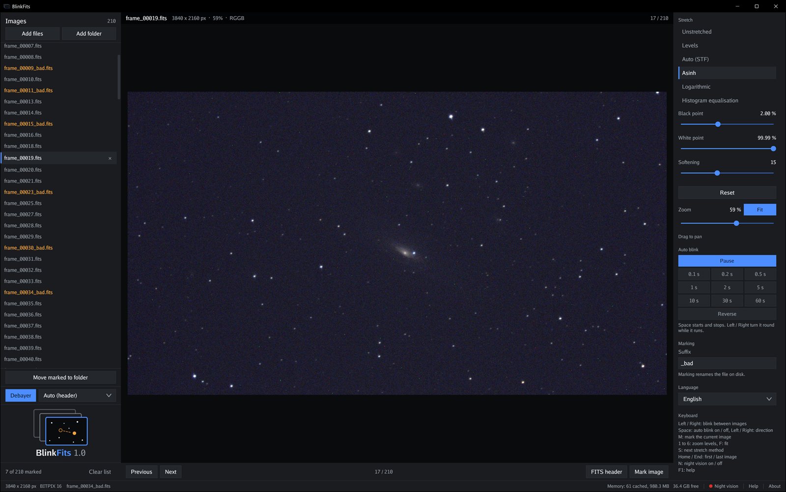 BlinkFits with 210 raw frames of NGC 7331 loaded: file list with Move marked to folder on the left, the debayered frame in the middle, stretch, zoom, auto blink, marking suffix and language settings on the right, seven frames marked with the _bad suffix